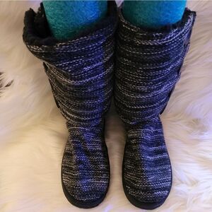 Black and white under the knee boots